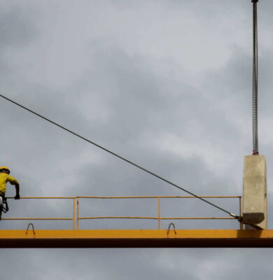 man-stand-on-crane man-stand-on-crane